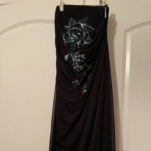 Brand new original dress. A friend made this dress for me and I never wore it.